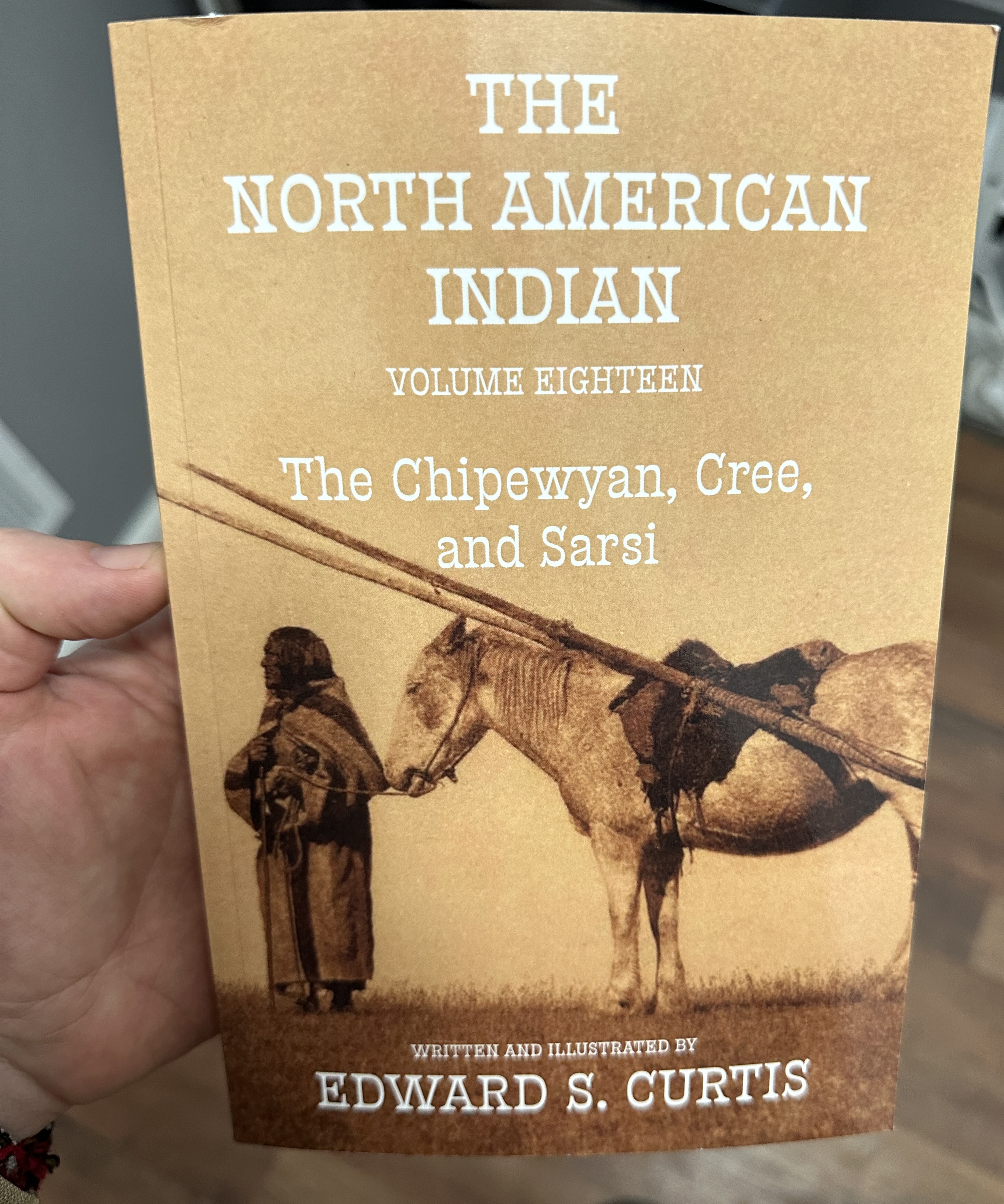 Edward Curtis paperback volumes showing printed text and quality binding