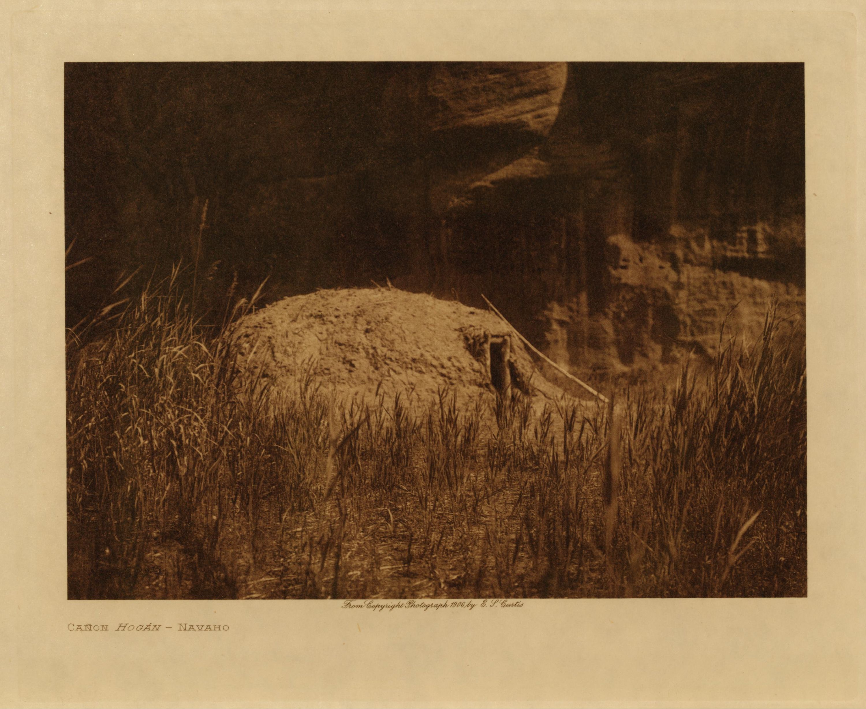 Cañon Hogán — Navaho. Photogravure plate from the same volume.